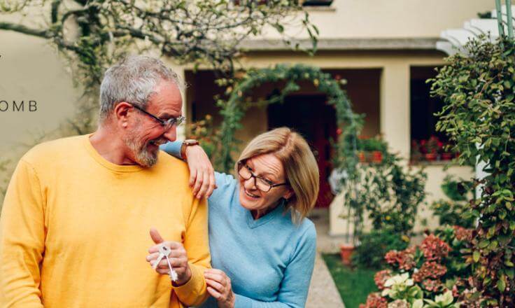 Two people walking in conversation.